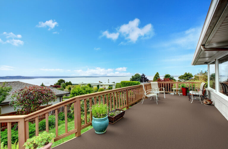 Wooden,Walkout,Deck,With,Patio,Table,And,Water,View